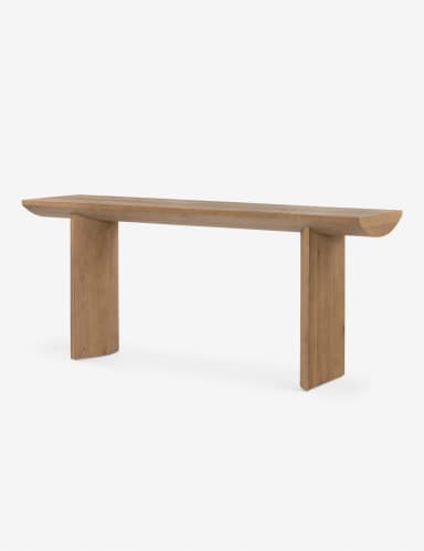 A long, narrow console table with a solid wood top and two block-like legs. The top has a gently curved edge on one side and a flat edge on the other. The legs are rectangular in shape and are positioned at the ends of the table. The wood grain is visible throughout the piece. — 3D model