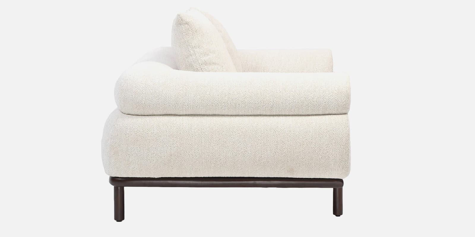 A contemporary loveseat upholstered in off-white bouclé fabric, featuring a plush, rounded design, broad armrests, and a recessed dark wood base with short, cylindrical legs. — 3D model