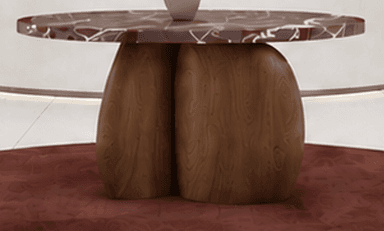 A sculptural round coffee table featuring a reddish-brown marble top with white veining, supported by three robust, organically shaped wooden legs with a distinct wood grain. — 3D model