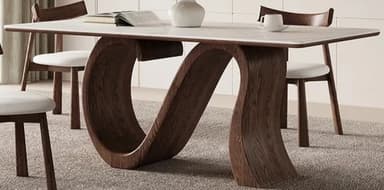 A modern rectangular coffee table featuring a white faux marble top and a unique, sculptural dark wood base with a curved, S-shaped design. — 3D model
