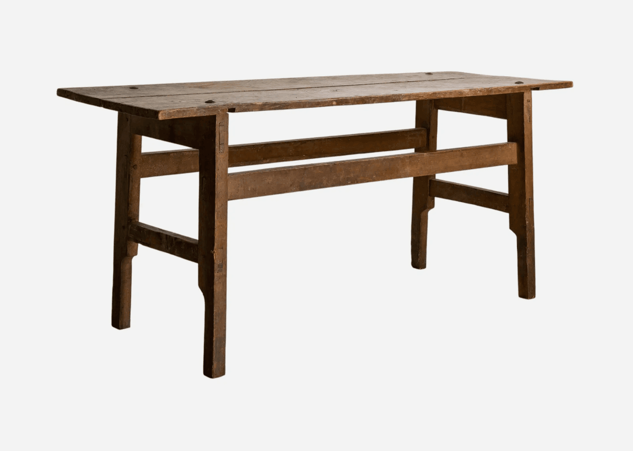 A rustic, rectangular wooden console table with a plank top and simple stretcher-reinforced legs, exhibiting significant wear and a natural aged patina. — 3D model