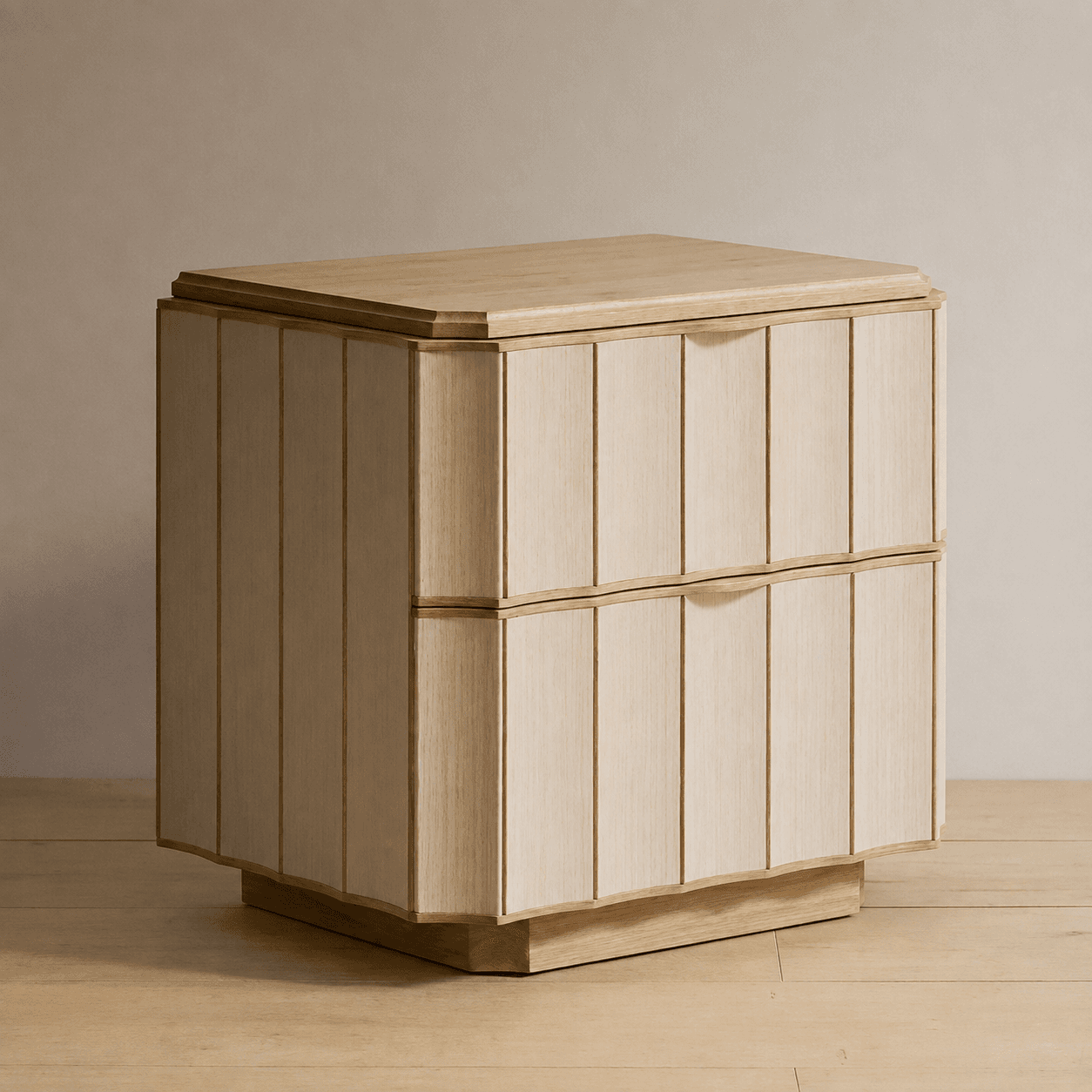 A compact, contemporary bedside cabinet featuring two drawers with distinctive fluted fronts and integrated pulls, crafted from light-toned oak wood. — 3D model