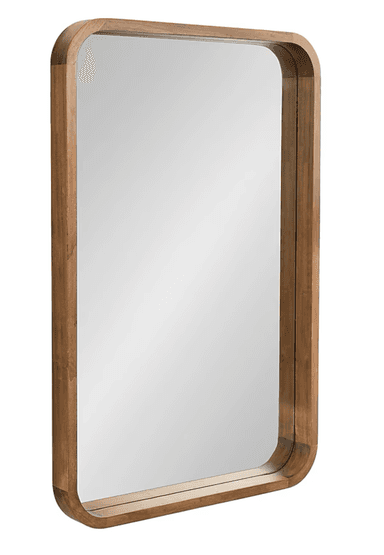 A rectangular mirror with rounded corners, encased in a wooden frame. The frame has a smooth, rounded profile and appears to be made of natural wood with a visible grain. The reflective surface is clear and shows a blurred reflection of what appears to be a dark, textured background or environment. — 3D model