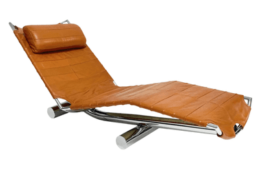 A contemporary chaise lounge with a curved, reclining design. The seat and back are upholstered in a stitched, padded orange-brown leather or leather-like material. The frame appears to be constructed from polished chrome or stainless steel, providing a sleek, modern aesthetic. A cylindrical headrest pillow, matching the upholstery, is attached to the upper section. — 3D model