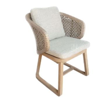 A modern armchair with a woven rattan back and sides, a cushioned seat and backrest, and a light wood frame. The armchair has curved armrests and a contemporary aesthetic, suitable for indoor or outdoor use. — 3D model
