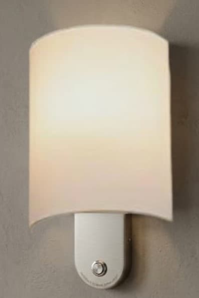 A modern, rectangular plug-in night light featuring a curved, frosted white diffuser attached to a brushed silver metal base. A small circular button is visible on the front of the base. — 3D model