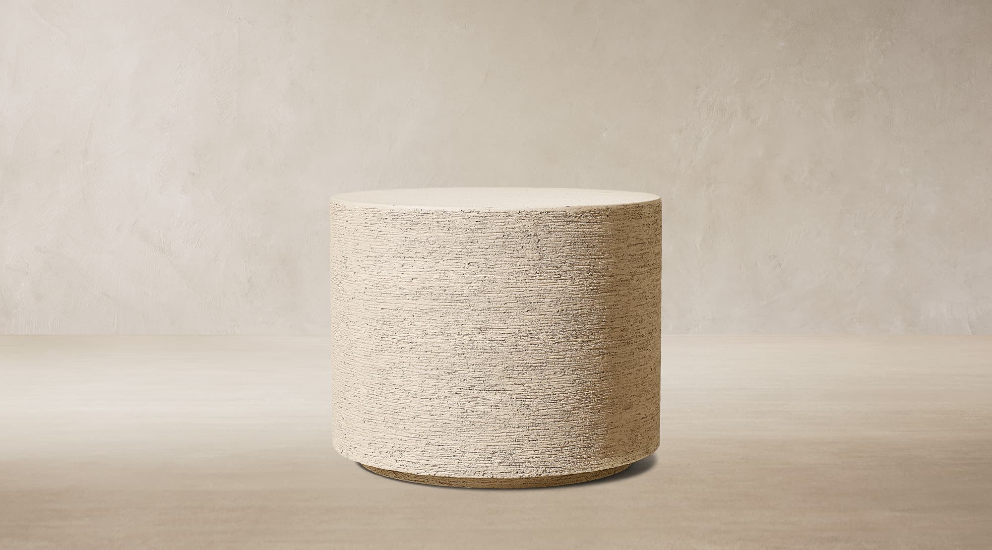A light beige, cylindrical object with a flat top, featuring a distinctively textured surface that suggests a composite or concrete-like material. It is uniform in diameter from top to bottom. — 3D model