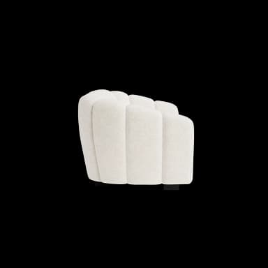 A plush, cream-colored sofa with a channel-tufted design. The sofa features rounded armrests and a continuous backrest, all upholstered in a textured fabric. It appears to be a three-seater or larger. — 3D model