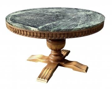 A round accent table featuring a dark green veined marble top and a carved wooden pedestal base with a four-legged support structure. The edge of the tabletop has a decorative carved molding. — 3D model