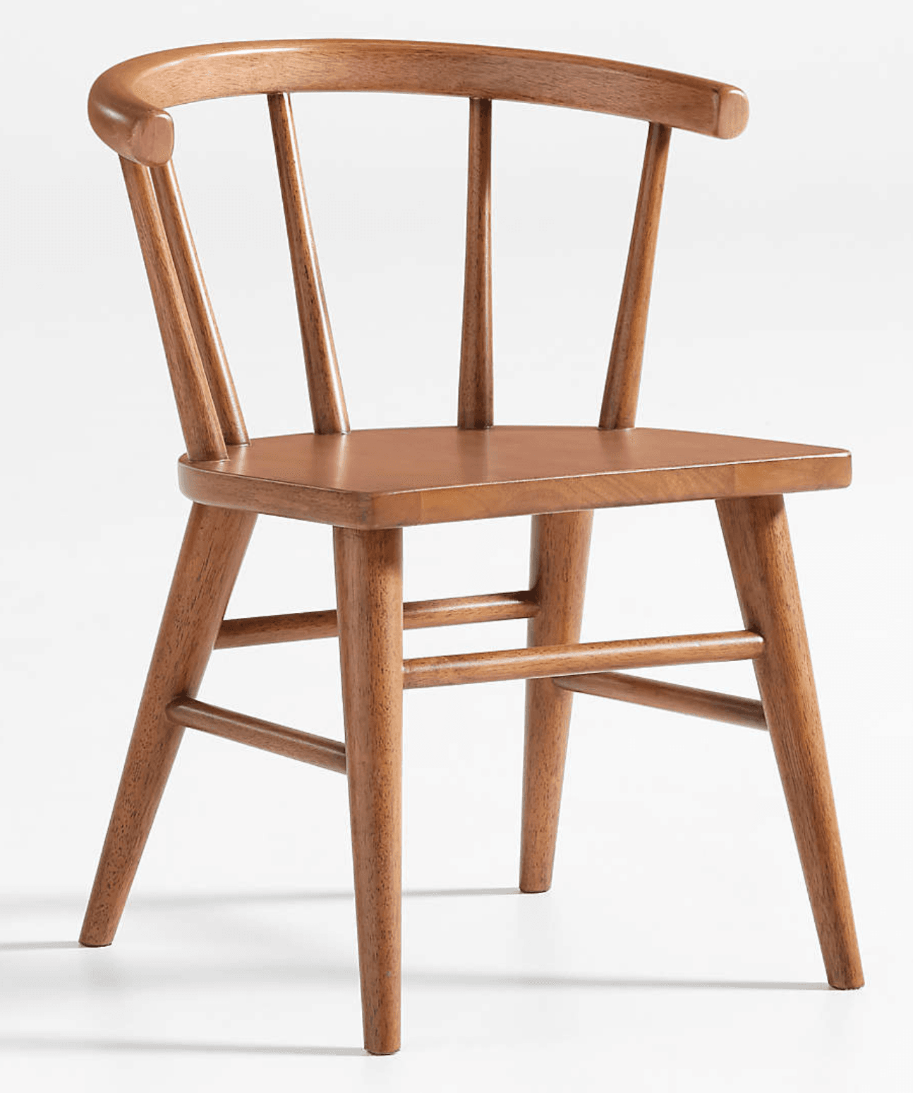 A modern wooden armchair featuring a solid seat and a spindle backrest with an integrated curved top rail that forms the armrests. The chair is constructed from wood with a medium brown finish, showcasing natural wood grain. It has four tapered legs reinforced with stretchers. — 3D model