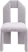 A contemporary fully upholstered chair with an distinctive arch-shaped backrest, rendered in a light gray and white melange textured fabric. The chair features a continuous, seamless form with no visible legs, creating a monolithic and sculptural appearance. — 3D model