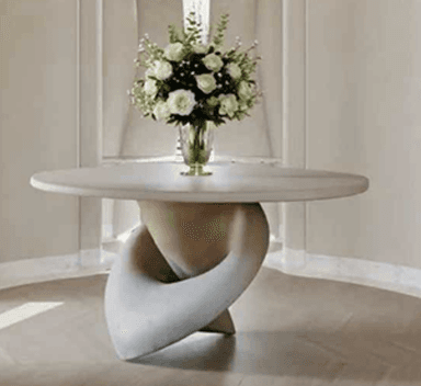 A modern side table featuring a round, smooth, light gray tabletop supported by a unique sculptural base. The base is an off-white or light beige color with a textured finish, formed by a single, continuously twisting or interlocking element that widens towards the bottom. The overall design is minimalist and contemporary. — 3D model