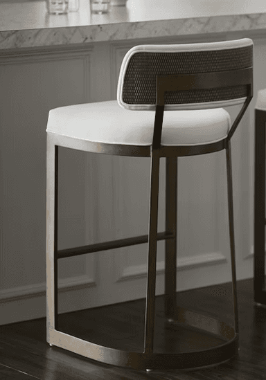 A modern bar stool featuring an aged brass metal frame and white upholstered seat and backrest, with a distinctive U-shaped sled base. — 3D model