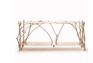 A two-tiered console table featuring an organic, branch-like structure for its supports, rendered in a gilded metal finish. — 3D model