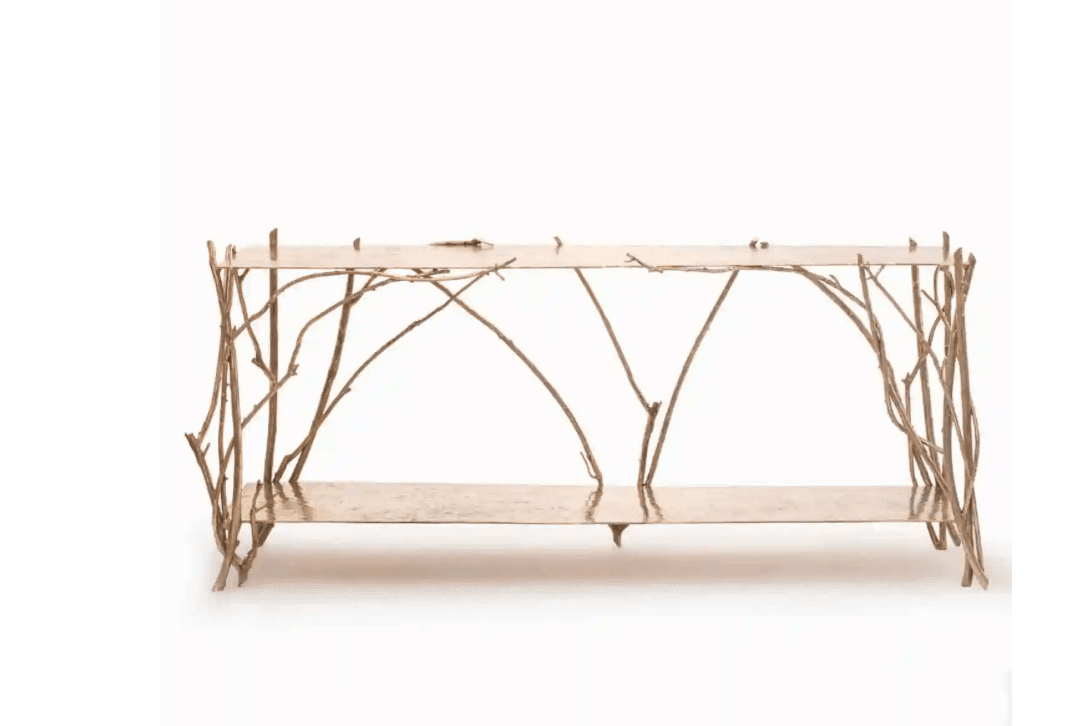 A two-tiered console table featuring an organic, branch-like structure for its supports, rendered in a gilded metal finish. — 3D model