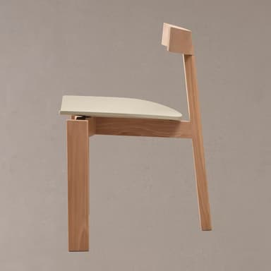 A modern dining chair with a curved backrest and a gently contoured seat. The chair features a wooden frame constructed from light-colored wood. The seat appears to be made of a contrasting material, possibly a molded plastic or a light-colored wood veneer, and is set within the wooden frame. The backrest is also wood and curves upward from a central vertical support. The legs are straight and tapered slightly. — 3D model