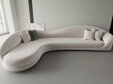An off-white, serpentine-shaped sofa upholstered in a boucle fabric, featuring a continuous, undulating form with an integrated low backrest and no arms. It comes with four throw pillows, two off-white and two dark gray. — 3D model