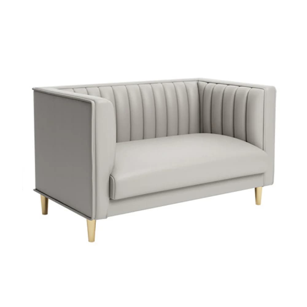 A compact two-seater loveseat upholstered in light gray material, featuring vertical channel tufting on the backrest and inner armrests. The piece has clean, rectangular lines and stands on four slender, tapered legs with a gold finish. The seat cushion is smooth, and the exterior of the arms and back are also smooth with piped edges. — 3D model