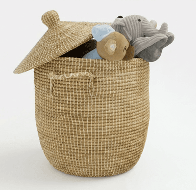 A tall, round, hand-woven storage basket with a conical lid, made from natural fibers, and featuring integrated loop handles on the sides. The basket contains several plush toys. — 3D model
