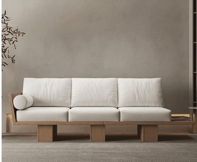 A modern three-seater sofa featuring a distinctive light wood platform frame and off-white upholstered cushions. It includes an integrated side table extension on one end, and a wooden armrest with a bolster on the other. — 3D model