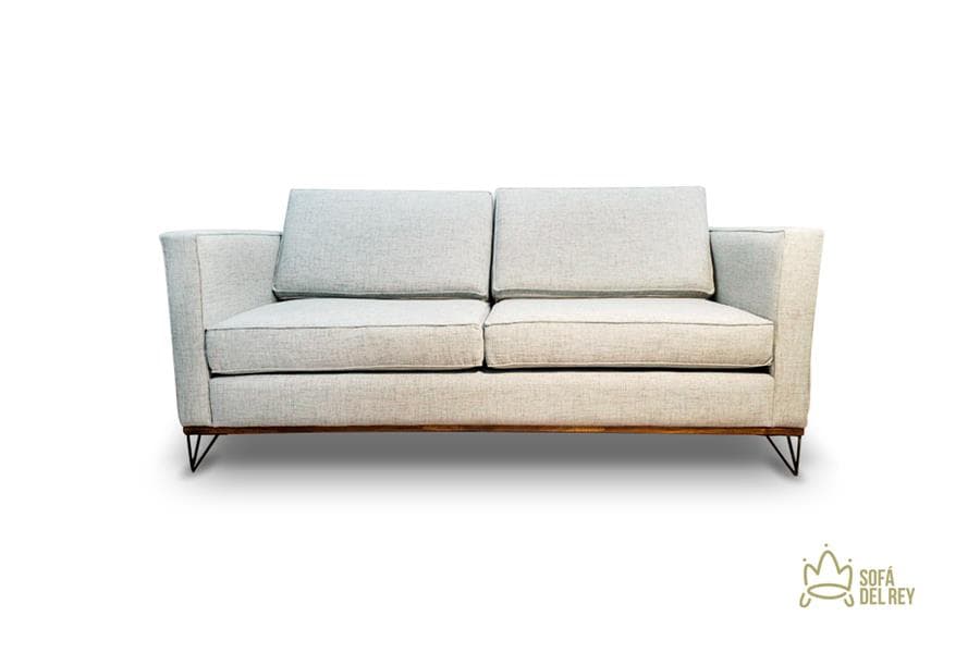 A modern two-seater sofa upholstered in light-colored fabric, featuring an exposed wooden base and dark angled metal legs. It has two seat cushions and two back cushions, with subtly flared track arms. — 3D model