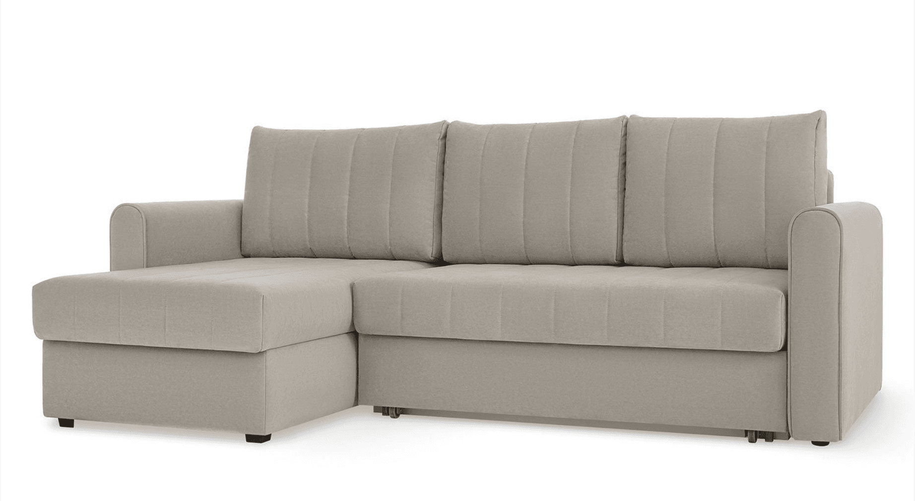A contemporary sectional sofa featuring a chaise lounge extension on the left-hand side. It is upholstered in a light beige fabric with vertical channel tufting on the back cushions and horizontal tufting on the seat cushions and chaise. The sofa has clean lines and rounded, slightly padded track arms. The base appears solid with small, discreet feet, and there are visible wheels under the main sofa section, suggesting a potential pull-out bed mechanism. — 3D model