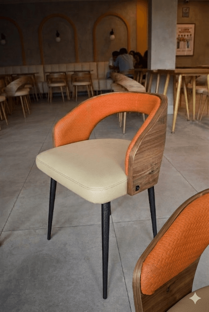 A modern dining chair featuring a curved backrest, upholstered seat, and wooden accents. The chair has a distinct sculptural form with a blend of materials. — 3D model