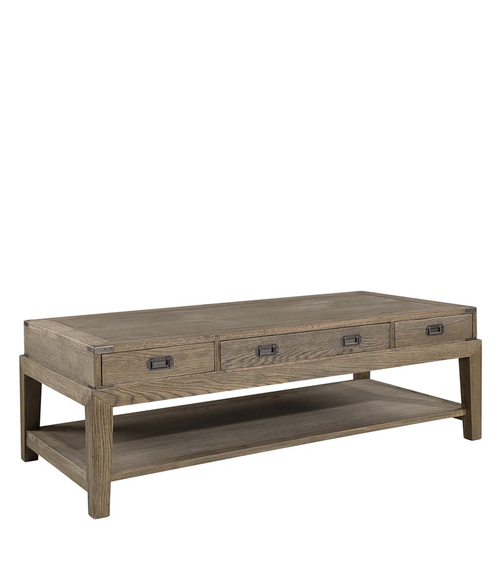 A rectangular coffee table constructed from wood. It features four drawers across the front with dark metal hardware, and a lower shelf for additional storage. The table has a rustic or industrial style, with visible wood grain and metal corner accents on the tabletop. — 3D model