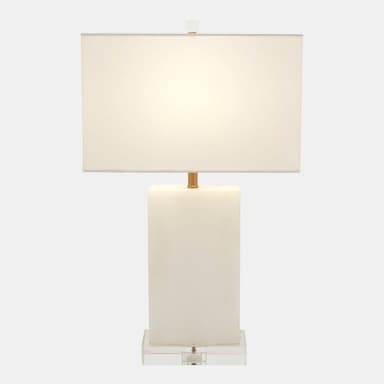 A modern table lamp with a rectangular shade and a rectangular base. The base of the lamp is translucent white and sits on a clear acrylic block base. The shade is made of a white fabric. — 3D model