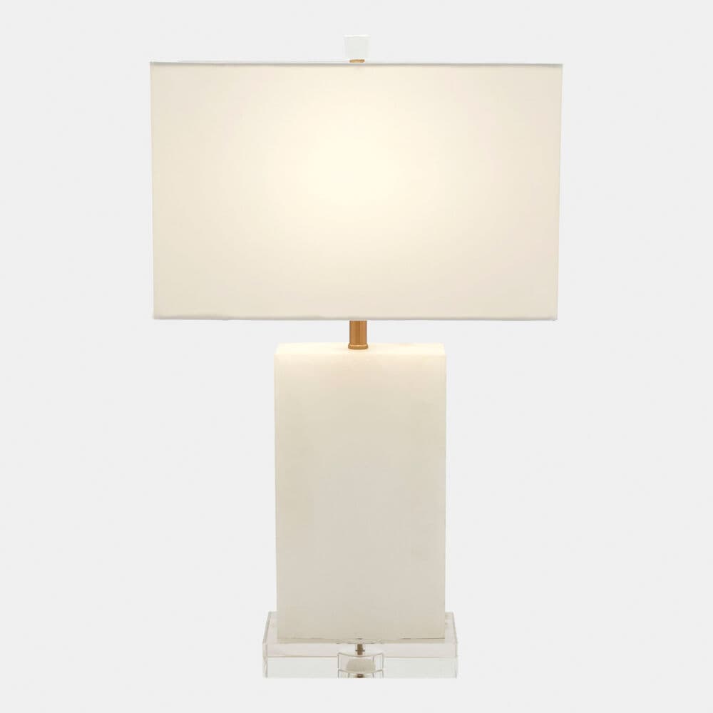 A modern table lamp with a rectangular shade and a rectangular base. The base of the lamp is translucent white and sits on a clear acrylic block base. The shade is made of a white fabric. — 3D model