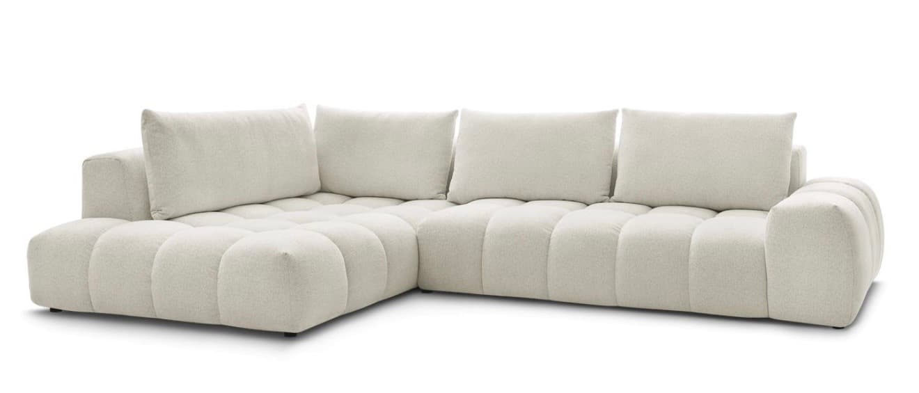 A sectional sofa with a low profile and deep seating. The sofa features a tufted seat and back cushions with a channel-stitched pattern. It has plush, overstuffed cushions and a wide armrest on one side. The sofa is upholstered in a light-colored, textured fabric. — 3D model