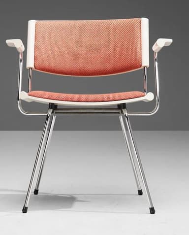 A modern armchair with a tubular metal frame and a molded plastic shell seat and back. The seat and back are upholstered with a textured orange-red fabric. The armchair features slender, chrome-plated legs that splay outwards and integrated armrests. — 3D model