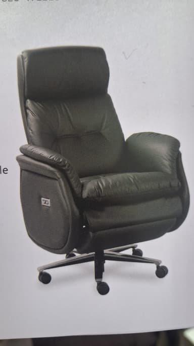 A contemporary dark gray power recliner chair featuring plush, segmented cushioning upholstered in what appears to be leather or high-quality faux leather. It has a high back with an integrated headrest, padded armrests, and a five-star chrome-finished swivel base with casters, suggesting both mobility and reclining functionality. A control panel for power recline is visible on the right side. — 3D model