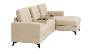 A modular beige sofa composed of three sections, with the rightmost section forming a chaise lounge. Each seating section features thick, upholstered cushions and integrated armrests. Between the first two seating sections and the second and third seating sections (on the chaise), there are dark wood consoles with built-in cup holders. The sofa is supported by slender, dark, angled legs. — 3D model