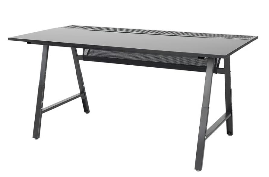 A modern desk with a sleek, dark tabletop and a metallic frame. The tabletop appears to be made of a smooth material, possibly glass or a laminate, and features a textured strip along the back edge. The frame consists of A-shaped legs connected by a mesh shelf that runs the width of the desk, located beneath the tabletop. The overall design is minimalist and functional, suitable for office or gaming use. — 3D model