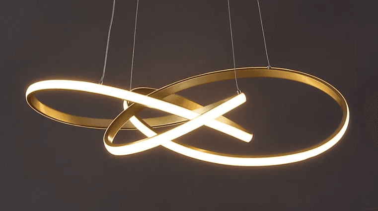 A modern, abstract pendant light featuring multiple interlocking circular and elliptical rings with an integrated LED light source and a brass-tone finish. — 3D model