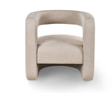 A contemporary armchair with a rounded, sculptural form. The armchair features a fully upholstered body with a curved backrest that extends into integrated armrests. The seat is also upholstered and appears to be well-padded. The base has a subtle curve, providing a modern aesthetic. The fabric has a textured, boucle-like appearance. — 3D model