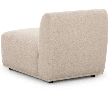 An upholstered armless chair, likely a modular component, featuring a low profile and a simple, blocky form. The backrest is gently curved at the top, and the entire piece is covered in a light beige, textured fabric, resembling bouclé or a coarse weave. It rests on small, recessed dark feet. — 3D model