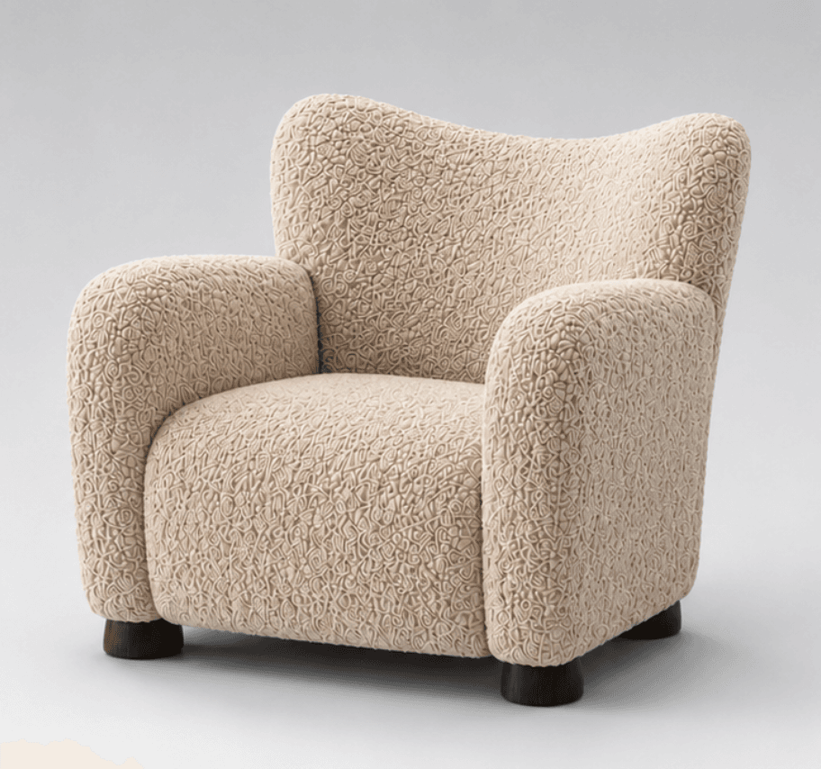 A modern upholstered armchair featuring a distinctive highly textured, beige fabric and a rounded, inviting silhouette, set on small, dark wooden feet. — 3D model