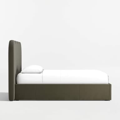 A bed frame with a scalloped headboard and a platform base. The headboard has a curved, wavy top edge. The bed frame is upholstered and appears to have storage drawers integrated into the base, with distinct panel lines visible on the front and sides. White bedding, including a sheet and two pillows, is present on the mattress. — 3D model