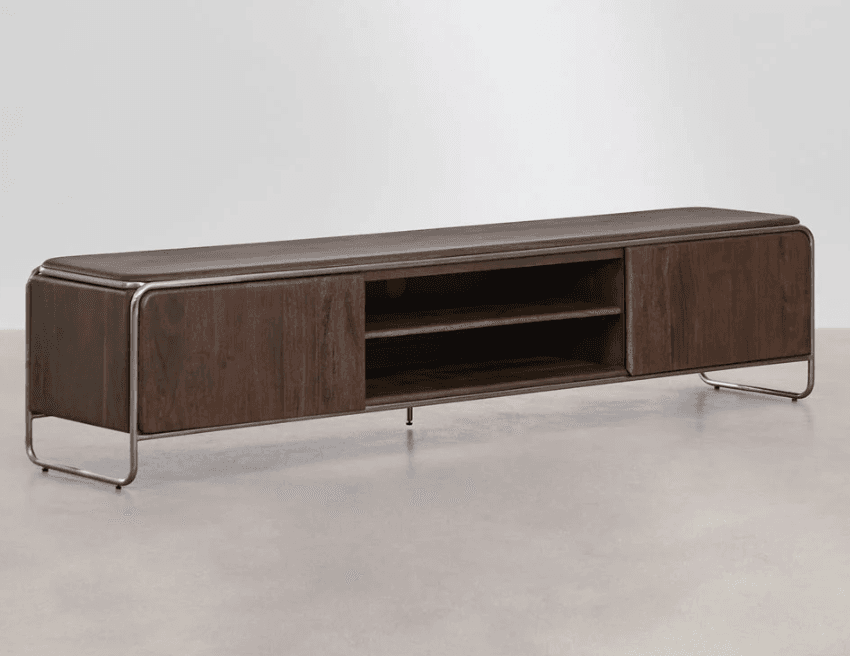 A long, low-profile TV stand with a dark wood grain finish. It features two cabinet doors on the sides and an open central section with two shelves. The unit is supported by a minimalist metal frame with thin, rounded legs. The top surface is a continuous plane, and the edges are softly rounded. A metallic trim runs along the top edge of the main body. — 3D model