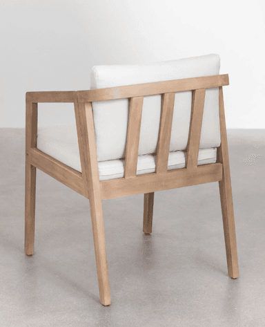 A wooden armchair with a slatted back and upholstered cushions. The chair features a light wood frame with straight legs and armrests. The backrest is composed of vertical wooden slats, and the seat and back are covered with white cushions. — 3D model