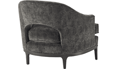 A contemporary armchair with a rounded, barrel-shaped back and a deep seat. The upholstery features a subtle geometric pattern. The chair is supported by a dark wooden base and four tapered legs. — 3D model