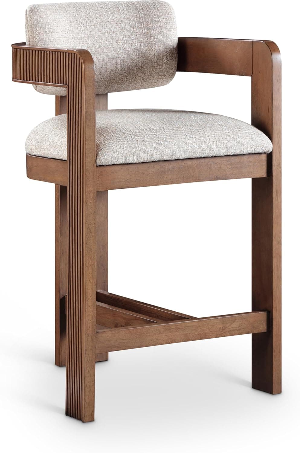 A contemporary counter-height stool featuring a solid wood frame with a medium brown finish. The design incorporates distinctive fluted detailing on the front right leg and a portion of the left armrest. It has a cushioned, upholstered seat and a curved backrest, both covered in a light beige, textured fabric. The stool includes an integrated footrest for comfort and stability. — 3D model