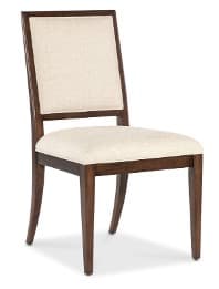 A single armless dining chair featuring a dark brown wooden frame and light beige fabric upholstered seat and backrest. The backrest has a distinctive rectangular wooden frame surrounding the upholstered panel, and the back legs are slightly splayed, while the front legs are straight. — 3D model