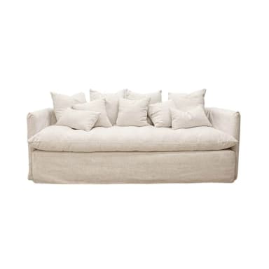 A plush, generously sized sofa with a loose, slipcover-like design. It features deep seat cushions and a supportive back, adorned with multiple scatter cushions of varying sizes. The arms are wide and straight, contributing to a relaxed yet structured aesthetic. — 3D model