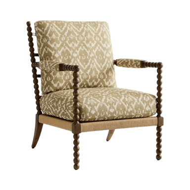 An upholstered armchair featuring a distinctive spool-turned wooden frame, ikat-patterned fabric, and a rope-wrapped seat base. — 3D model