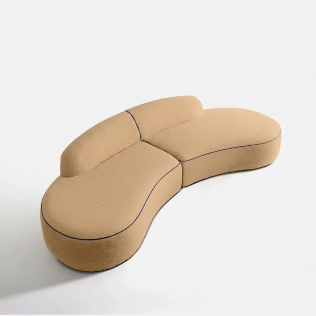 A modern, modular sectional sofa with a distinctive biomorphic, curved design, upholstered in a textured beige bouclé fabric with dark piping details. — 3D model
