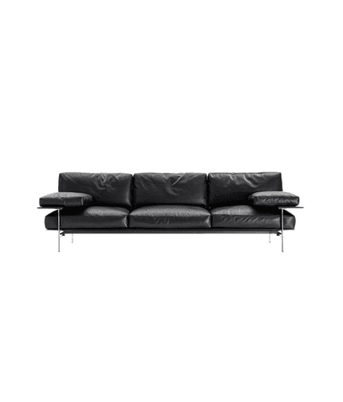 A three-seater sofa upholstered in black leather. The sofa features a sleek, modern design with thin metal legs and armrests that extend outward as flat platforms. The seat and back cushions are plush and appear to be filled with a soft material. Integrated side tables on the armrests are a notable design element. — 3D model