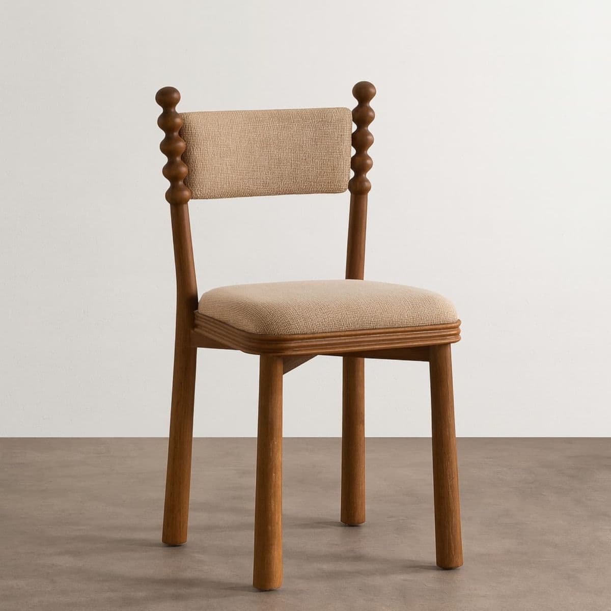 A wooden chair with a cushioned seat and backrest. The chair features turned wood spindles along the upper part of the backrest frame, and the legs are also wooden. The upholstery is a textured beige fabric. — 3D model